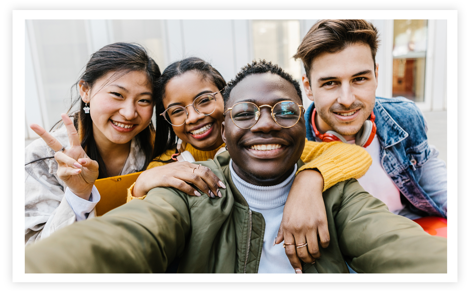 Photo of 4 happy students